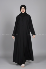 Black Coat Style Abaya for women in Pakistan is crafted with Premium Nida Korean Fabric and Button Style on Sleeves