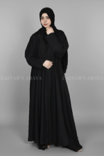 Black Coat Style Abaya for women in Pakistan is crafted with Premium Nida Korean Fabric and button style sleeves.
