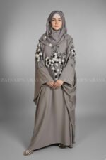 Nida Kaftan Abaya for women in Pakistan with Stone Detailing specifically designed for weddings and formal party wear. It comes with a matching scarf in chiffon fabric with same stone detailing.