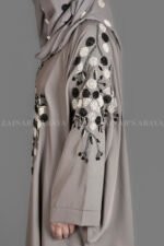 Nida Kaftan Abaya for women in Pakistan with Stone Detailing specifically designed for weddings and formal party wear. It comes with a matching scarf in chiffon fabric with same stone detailing.