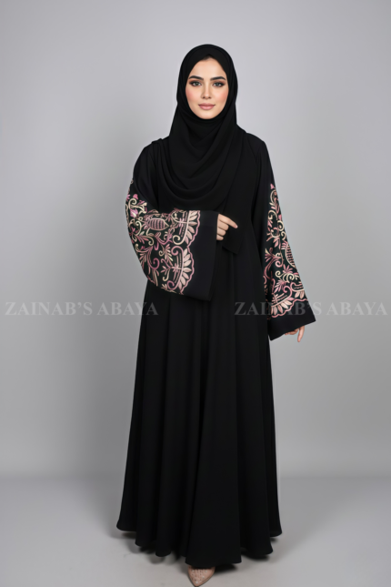 Nida Umbrella Abaya for women in Pakistan at cheap price featuring the arabic embroidery includes a matching scarf in chiffon fabric.