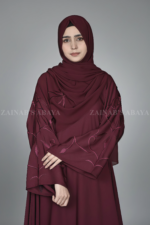Nida Maxi Abaya for women in Pakistan with Stylish Embroidered Sleeves and a matching scarf.