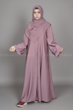 Nida Kasni Colored Front Open Abaya for women in Pakistan with embroidered sleeves as well as a matching scarf.