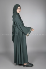 Nida Umbrella Abaya for women in Pakistan with embroidery and comes with a scarf in chiffon fabric.