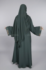 Nida Umbrella Abaya for women in Pakistan with embroidery and comes with a scarf in chiffon fabric.