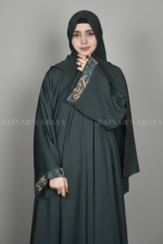 Nida Umbrella Abaya for women in Pakistan with embroidery and comes with a scarf in chiffon fabric.