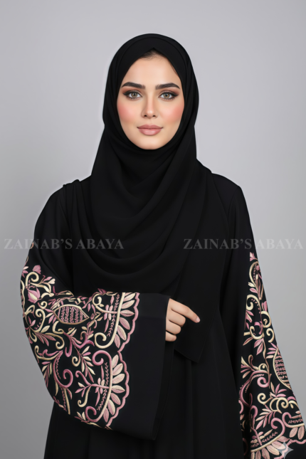 Nida Umbrella Abaya for women in Pakistan featuring the arabic embroidery includes a matching scarf in chiffon fabric.