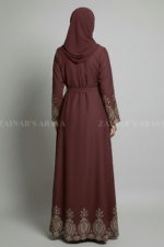 Nida Double Front Open Gown Abaya for women in Pakistan features embroidery on front back and sleeves or it comes with a matching scarf in chiffon fabric.
