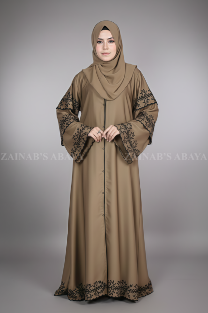 Nida color front open gown abaya with 3 layers of embroidery on the arms and bottom, offering a stylish and elegant design.