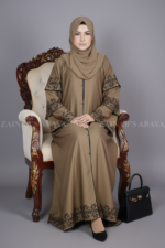 Nida color front open gown abaya with 3 layers of embroidery on the arms and bottom, offering a stylish and elegant design.