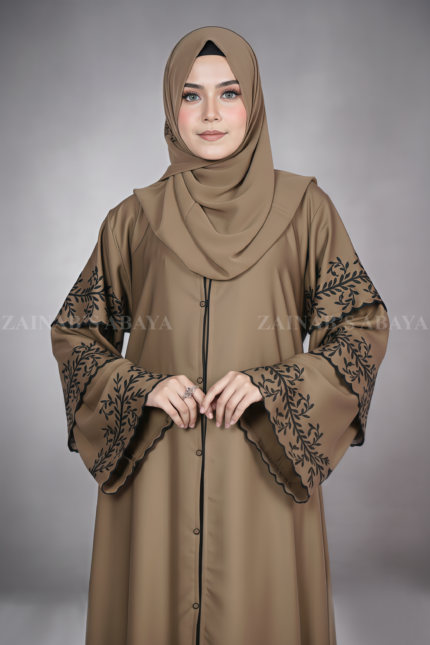 Nida color front open gown abaya with 3 layers of embroidery on the arms and bottom, offering a stylish and elegant design.