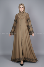 Nida color front open gown abaya with 3 layers of embroidery on the arms and bottom, offering a stylish and elegant design.