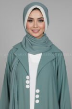 Nida Coat Style Abaya with Inner in Pakistan featuring the smart coat collar style, button on front and comes with a matching scarf in chiffon fabric.