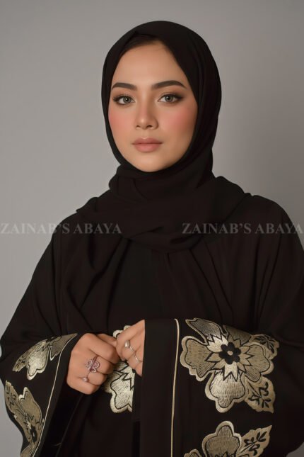 Nida Umbrella Abaya for women in Pakistan with stylish embroidery comes with a matching scarf in chiffon fabric.