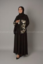 Nida Umbrella Abaya for women in Pakistan with stylish embroidery comes with a matching scarf in chiffon fabric.