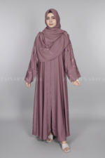 Nida Front Open Abaya for women in Pakistan features the stylish embroidered sleeves and a matching scarf in chiffon fabric.