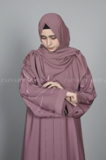 Nida Front Open Abaya for women in Pakistan features embroidered sleeves and a matching scarf in chiffon fabric.
