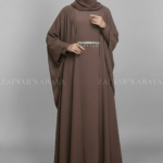 Nida Kaftan Abaya for women in Pakistan which is crafted with Premium Nida Korean Fabric it includes and inner or belt with lace work as well as matching scarf in chiffon fabric.