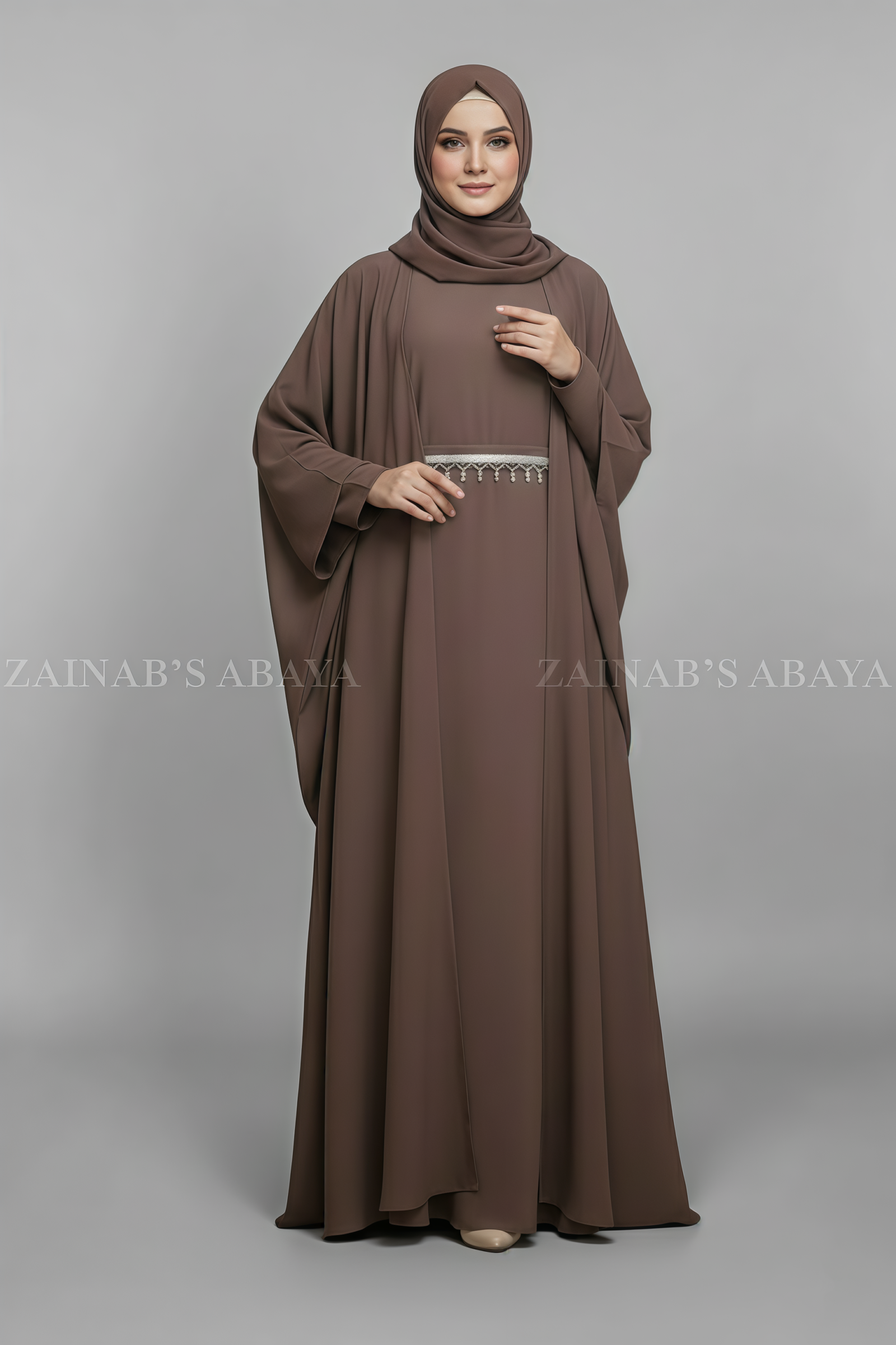 kaftan Abaya Nida Kaftan Abaya for women in Pakistan which is crafted with Premium Nida Korean Fabric it includes and inner or belt with lace work as well as matching scarf in chiffon fabric.