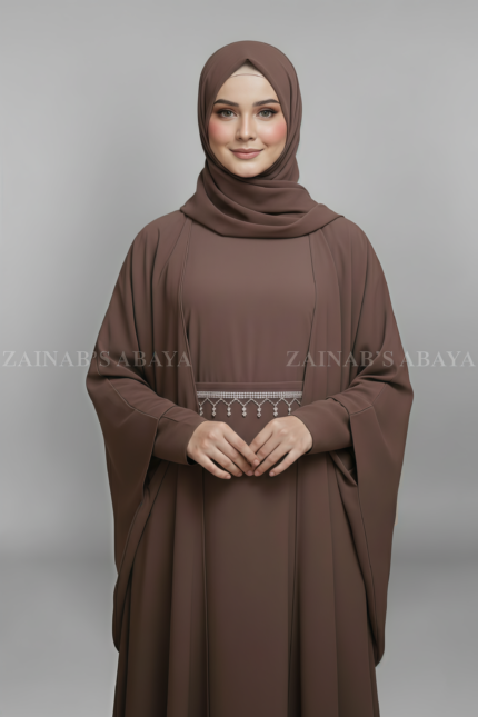Nida Kaftan Abaya for women in Pakistan which is crafted with Premium Nida Korean Fabric it includes and inner or belt with lace work as well as matching scarf in chiffon fabric.