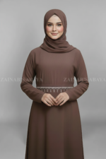 Nida Kaftan Abaya for women in Pakistan which is crafted with Premium Nida Korean Fabric it includes and inner or belt with lace work as well as matching scarf in chiffon fabric.