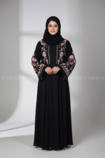 Nida Black Maxi Abaya for women in Pakistan featuring embroidery on front both sides or sleeves comes with a matching scarf in chiffon fabric.