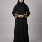 Nida Maxi Abaya for women in Pakistan with Embroidered Sleeves comes with a matching scarf in chiffon fabric.