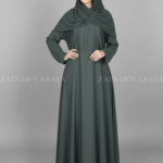 Nida Maxi Abaya for women in Pakistan features the elegant coat style from front comes with a matching scarf in chiffon fabric.