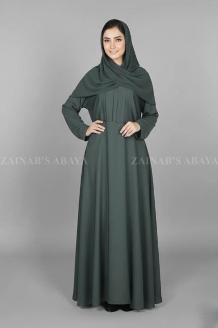 Nida Maxi Abaya for women in Pakistan features the elegant coat style from front comes with a matching scarf in chiffon fabric.