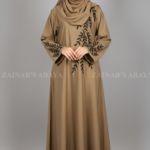 Nida Maxi Abaya for women in Pakistan with Embroidery on Front & Sleeves Cuffs comes with a matching scarf in chiffon fabric.