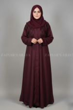 Nida front open abaya with intricate Zardozi work, offering a luxurious and elegant design.