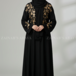 Nida Front Open Abaya for women in Pakistan with Embroidery on Front and Sleeves as well as a matching scarf in chiffon fabric.