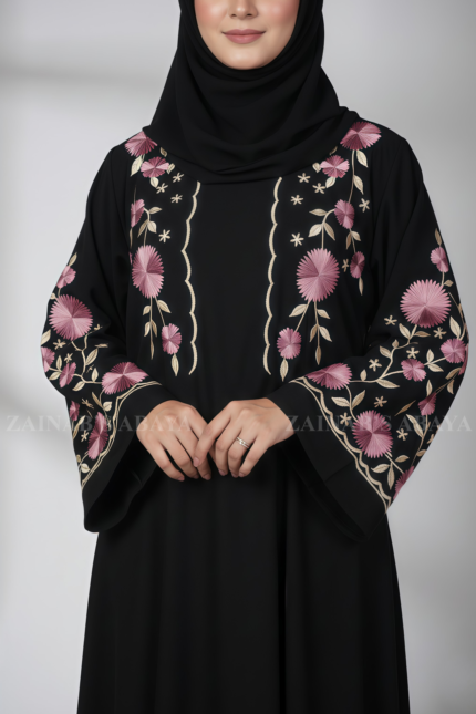 Nida Black Maxi Abaya for women in Pakistan featuring the elegant embroidery on front both sides or sleeves comes with matching scarf in chiffon fabric.