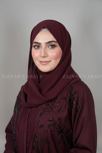Nida front open abaya with intricate Zardozi work, offering a luxurious and elegant design.