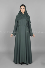Nida Maxi Abaya for women in Pakistan features the elegant coat style from front comes with a matching scarf in chiffon fabric.