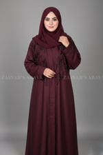 Nida front open abaya with intricate Zardozi work, offering a luxurious and elegant design.