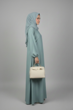 Nida Maxi Abaya for women in Pakistan comes with a matching attached scarf in chiffon fabric.