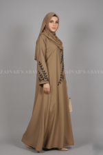 Nida Maxi for Women in Pakistan with Stylish embroidery on front and sleeves comes with a matching scarf in chiffon fabric.