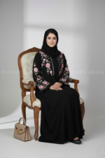 Nida Black Maxi Abaya for women in Pakistan which features the elegant embroidery on front both sides or sleeves comes with matching scarf in chiffon fabric.