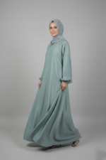 Nida Maxi Abaya for women in Pakistan comes with a matching attached scarf in chiffon fabric.