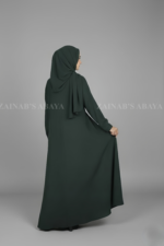 Nida Maxi Abaya for women in Pakistan features the elegant coat style from front comes with a matching scarf in chiffon fabric.