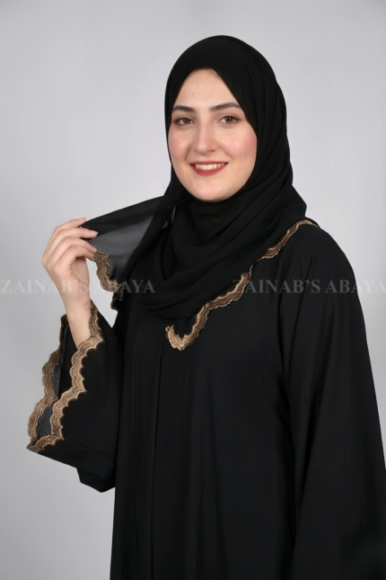 Front open gown abaya in Nida fabric with intricate embroidery, offering a modest and elegant design.