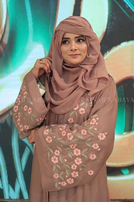 Nida front open gown abaya with intricate embroidery on the front and back, offering a stylish and elegant design.