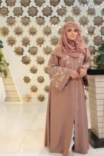 Nida front open gown abaya with intricate embroidery on the front and back, offering a stylish and elegant design.