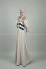 Nida maxi abaya with 3 stripe design and front buttons, offering a modern and modest look.