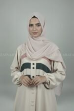 Nida maxi abaya with 3 stripe design and front buttons, offering a modern and modest look.