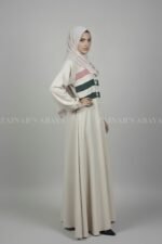 Nida maxi abaya with 3 stripe design and front buttons, offering a modern and modest look.
