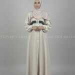 Nida maxi abaya with 3 stripe design and front buttons, offering a modern and modest look.