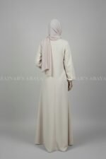 Nida maxi abaya with 3 stripe design and front buttons, offering a modern and modest look.
