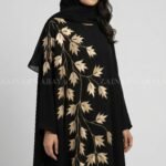 Nida Kaftan Abaya for women in Pakistan with Embroidery and matching scarf in chiffon fabric.
